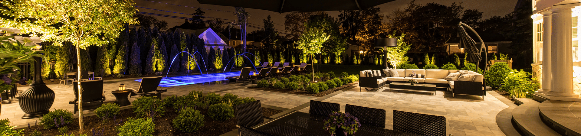 Outdoor living space with low-voltage landscape lighting